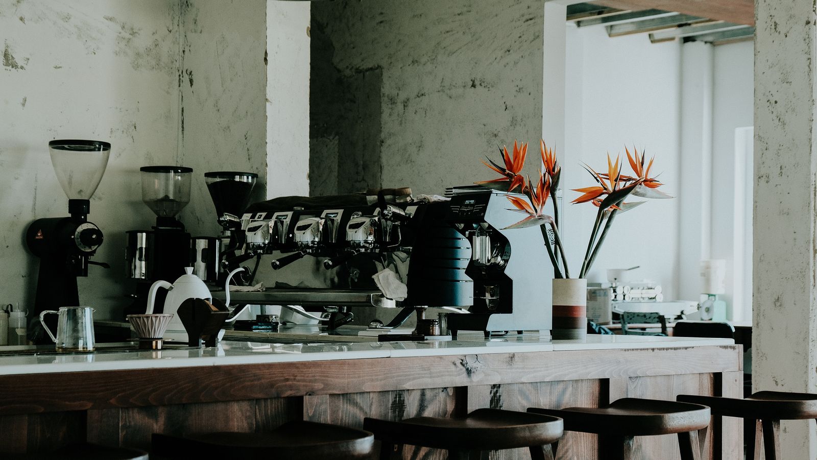 A bright café bar with an espresso machine