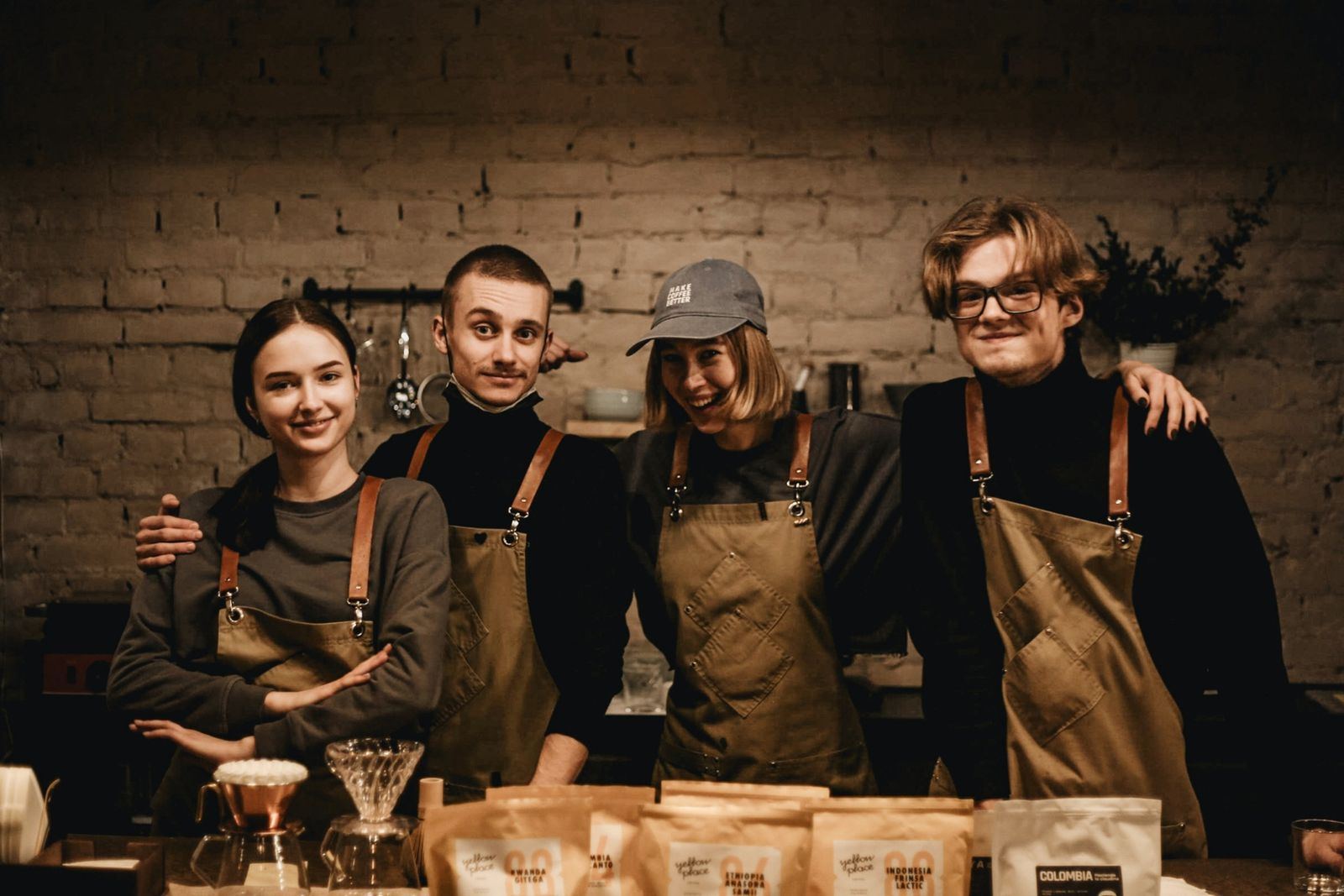 A café team in aprons